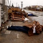 Bodies of civilians lie in the street, amid Russia’s invasion on Ukraine, in Bucha